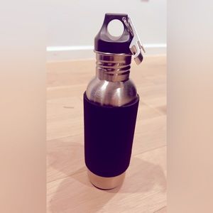 Stainless Steel Insulated Bottle Koozie
with Built-in Bottle Opener.